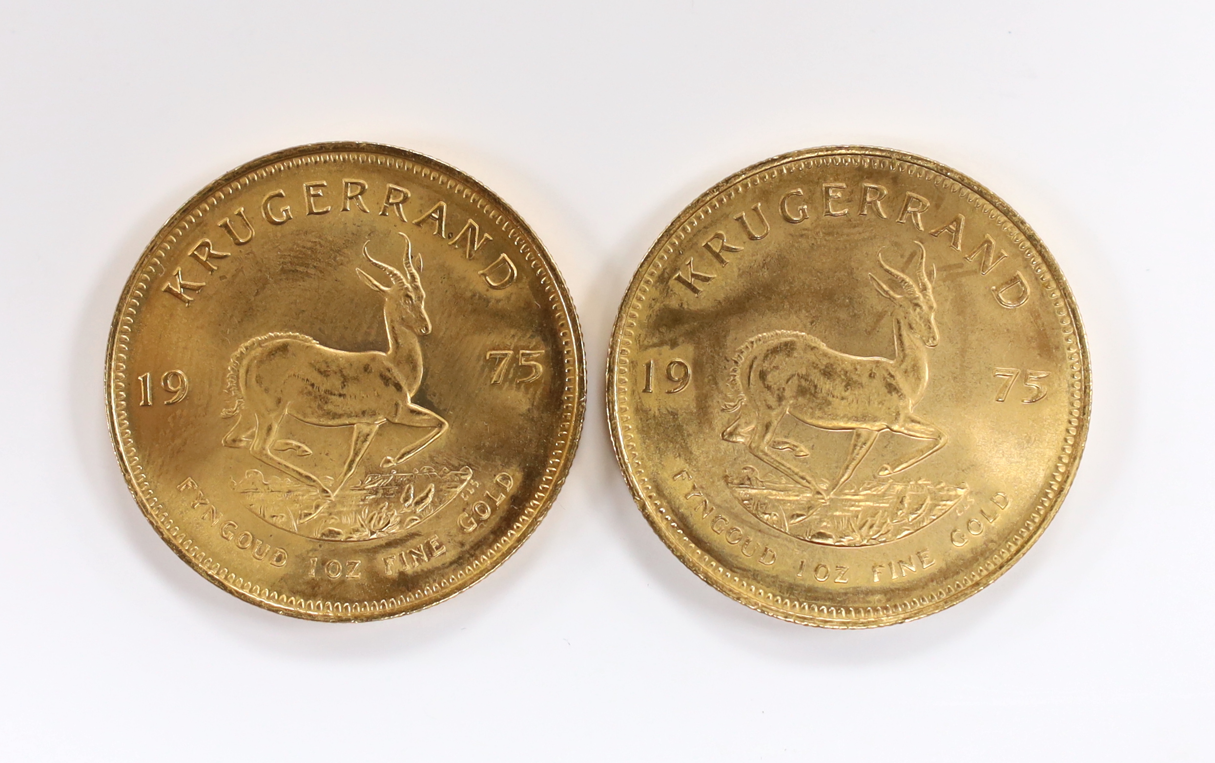 Gold coins, South Africa, two gold 1oz. Krugerrands, 1975, near UNC (2oz.)